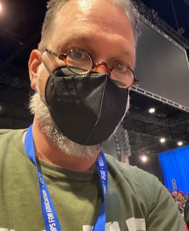 Michigan teacher in mask at the NEA Representative Assembly