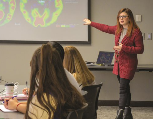 Image of Aspiring Educator Abbigail Ericson leading a workshop.