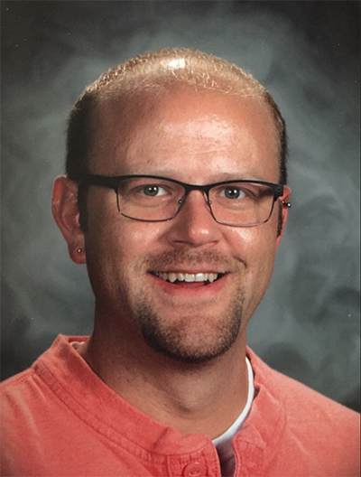 Headshot of NEA member Dirk Andrews