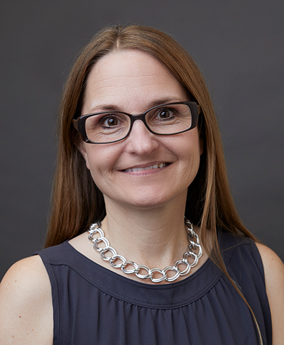 Headshot of Jill Scarcelli, an Illinois librarian.