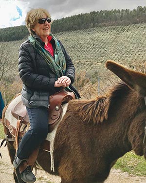 Lee Ann Prielipp takes a four-legged tour of a vineyard in Italy.