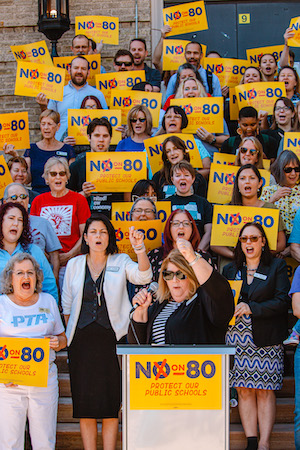 Educators in Colorado rally to defeat a voucher measure