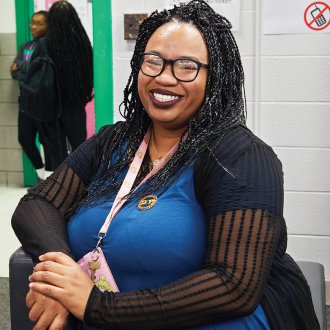 Kentucky language arts teacher Kennita Ballard, seated