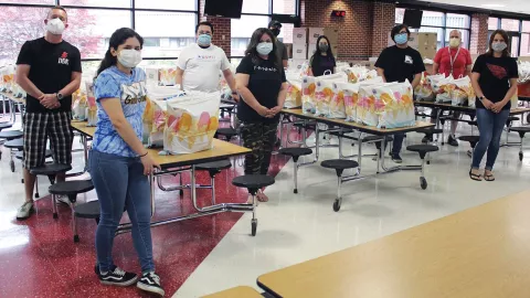 Chicago members of the Student Illinois Education Association partnered with area high school students to stock a food pantry for those affected by the pandemic.